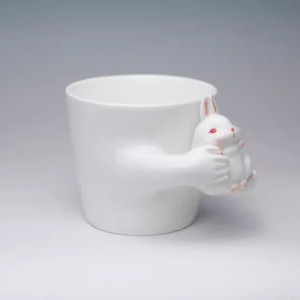 Rabbit in Hands Mug