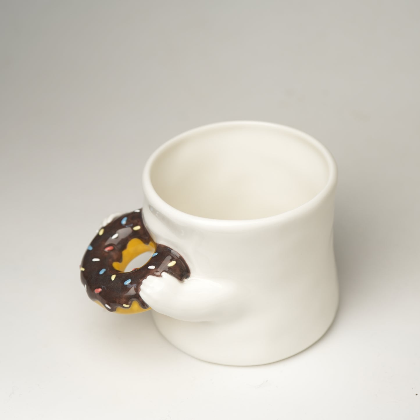 Biting Donut Mug